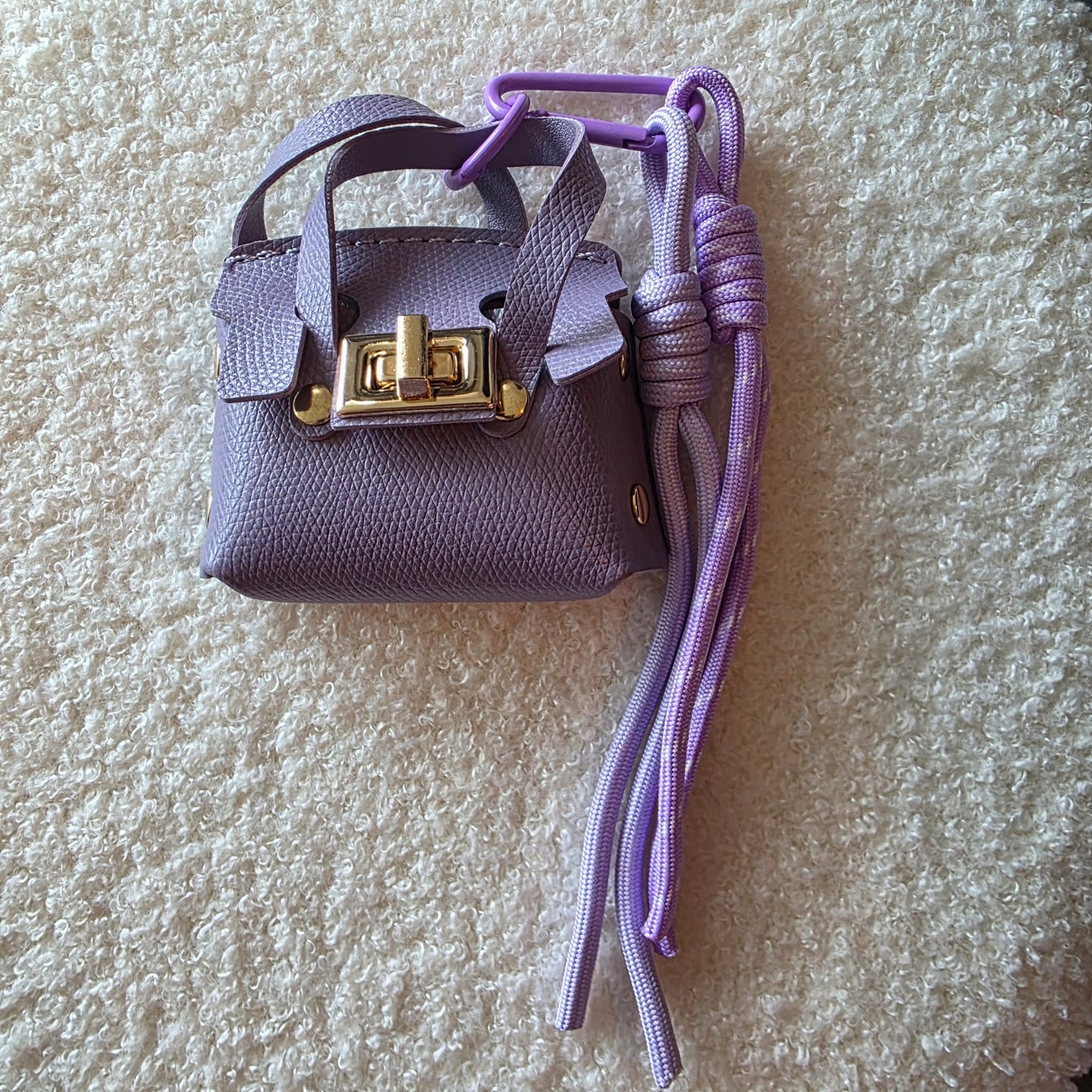 Paarse sleutelhanger tas