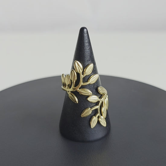 Elegante verstelbare ring van Jacobsz Atelier Doré met verfijnd bladeren design en gouden afwerking.