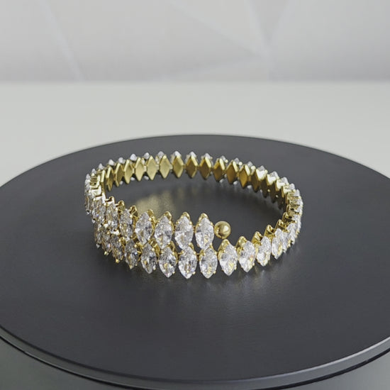 Elegante armband van Jacobsz Atelier Doré met marquise zircon stenen en luxe gouden afwerking.